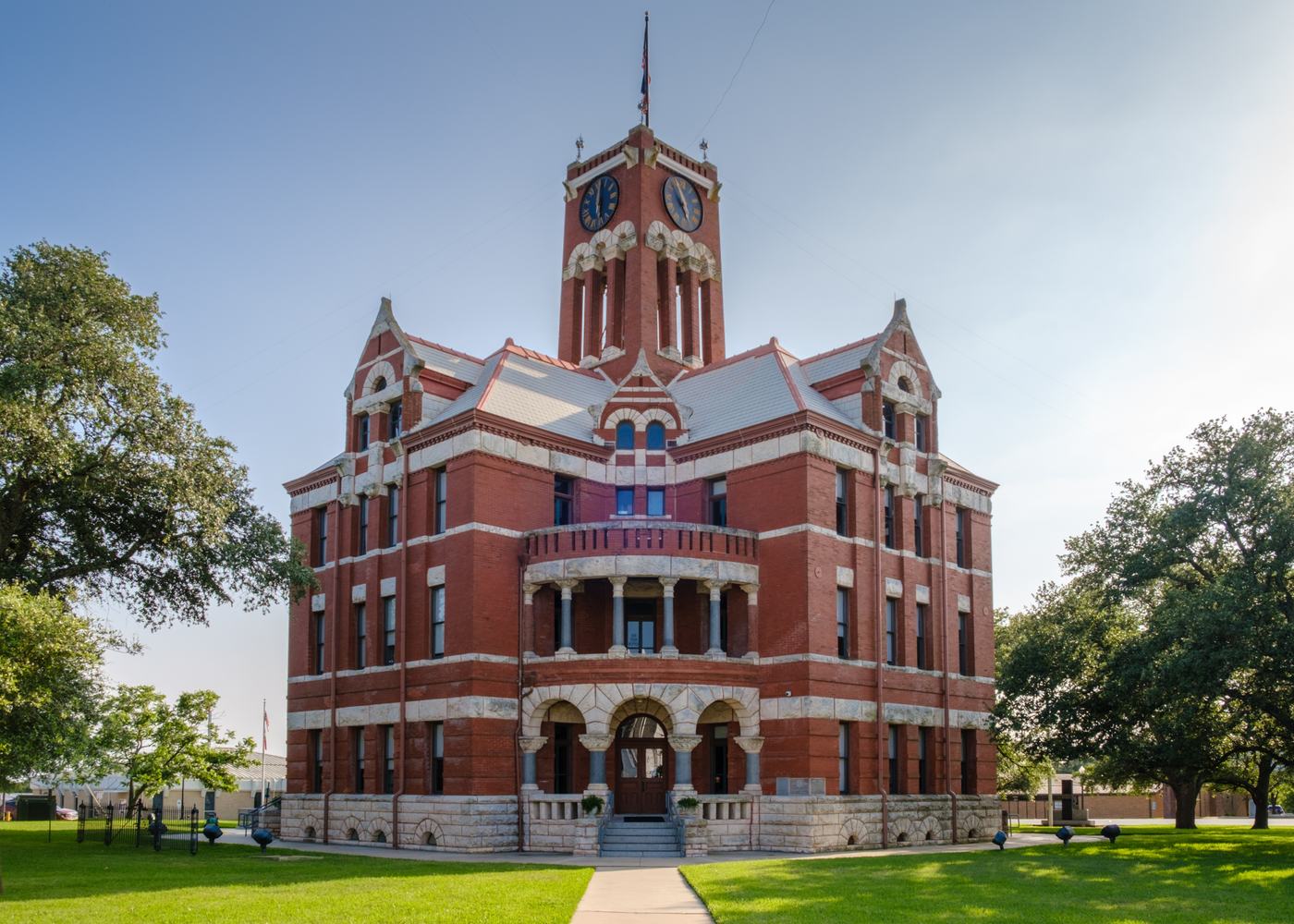 A historic Texas county courthouse on its town square.